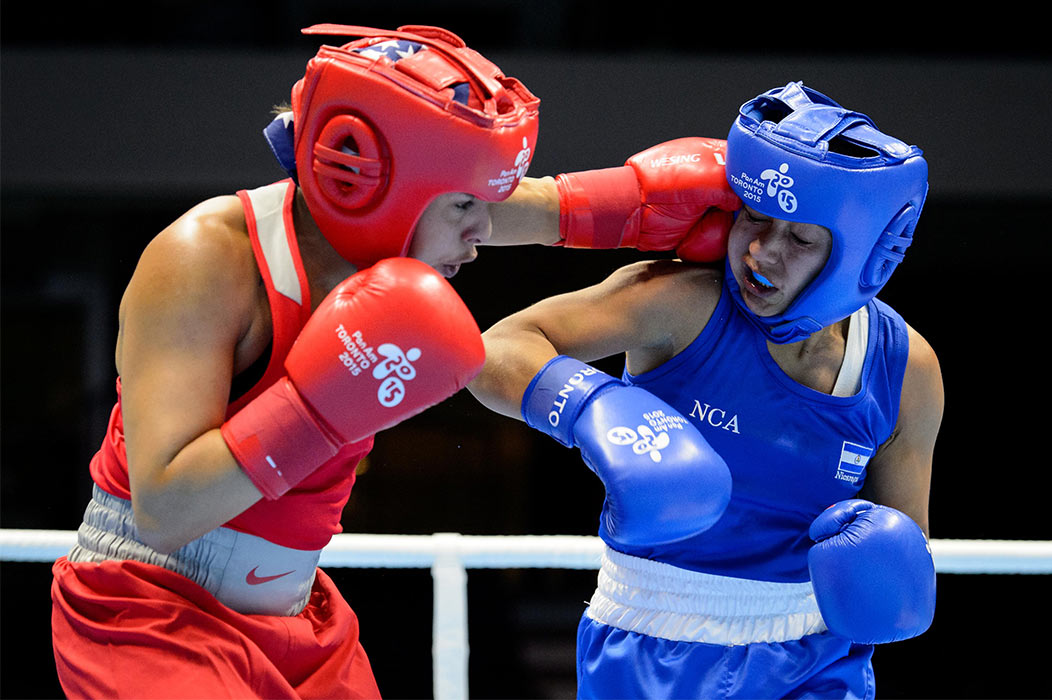 July 20, 2015: Marlem Esparaza of the United States lands a punch against Claudia Parrales Guevara of Nicaragua during their Women's Fly (48 - 51kg) Quarterfinals at the Oshawa Sports Centre in Oshawa, ON, Canada.
