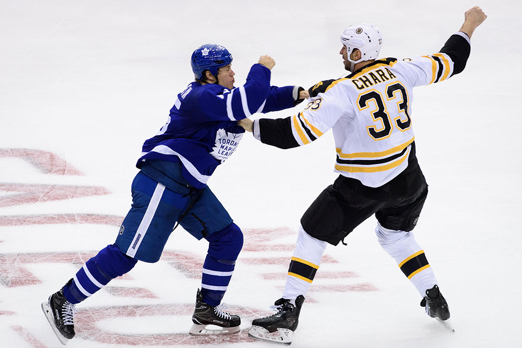 October 15, 2016: Boston Bruins Defenceman Zdeno Chara (33) fights against Toronto Maple Leafs Left Wing Matt Martin (15) during the third period of the NHL regular season game between the Toronto Maple Leafs and the Boston Bruins at Air Canada Centre in Toronto, ON, Canada.